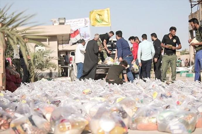 کمک&zwnj;رسانی کاروان مقاومت اسلامی نُجَباء عراق به سیل&zwnj;زدگان اهواز +تصاویر