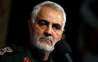 تصویری از پیکر شهید قاسم سلیمانی و آرامگاه او در گلزار شهدای کرمان
