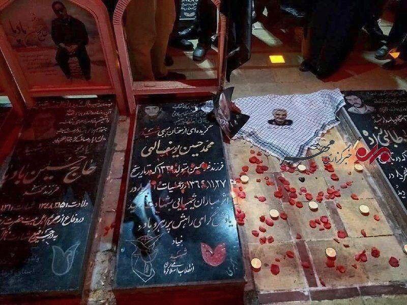 تصویری از پیکر شهید قاسم سلیمانی و آرامگاه او در گلزار شهدای کرمان