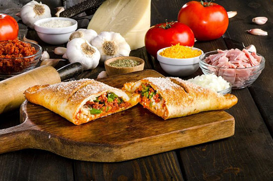 آموزش آشپزی؛ از پیتزا کالزونه ایتالیایی تا مرغ بریانی کویتی + طرز تهیه