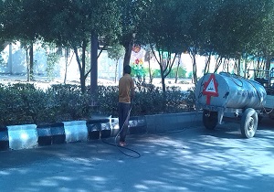 شستشو و رنگ آمیزی جداول در برخی مناطق اهواز