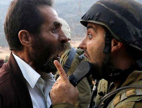 سخنان شجاعانه یک فلسطینی مقابل نظامیان صهیونیست +فیلم