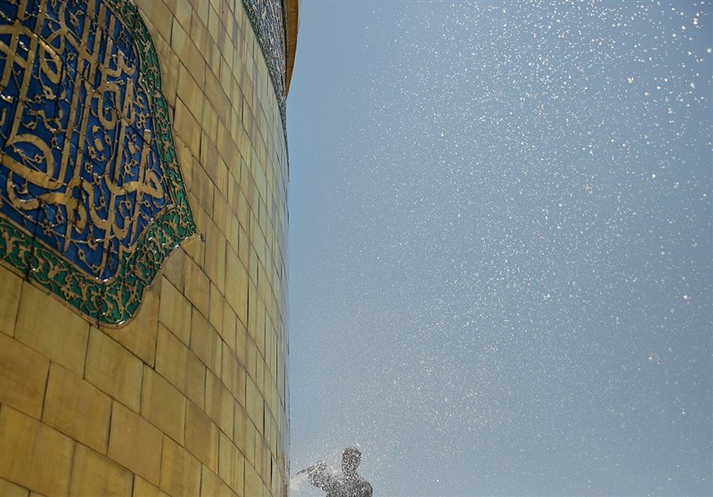 شست و شوی گنبد مطهر حضرت رضا (ع) +تصاویر