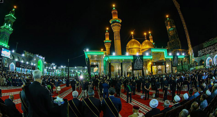 مراسم تعویض پرچم حرم امامین کاظمین(ع) +تصاویر