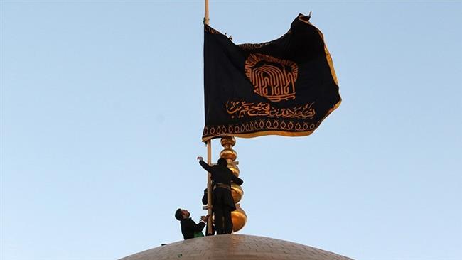 تعویض پرچم حرم رضوی