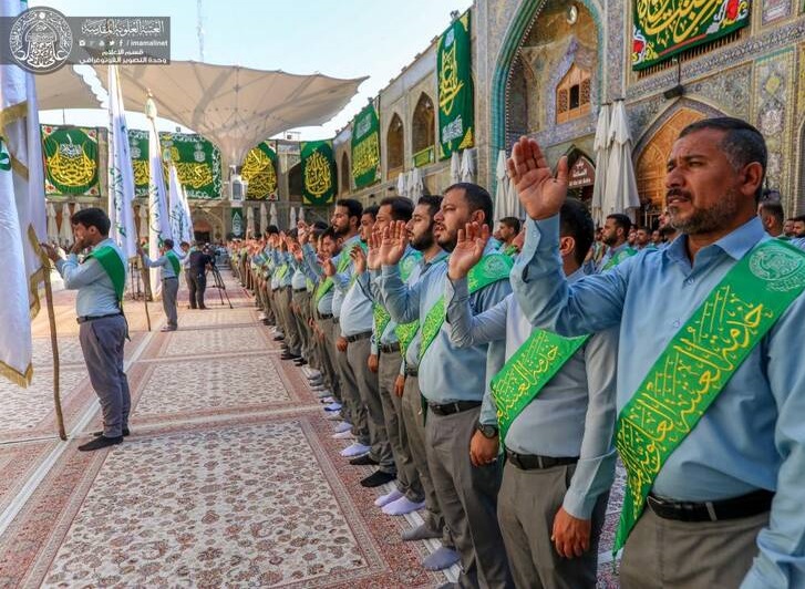 تصاویری بینظیر از مراسم تعویض پرچم ایوان طلای حرم امام علی(ع)