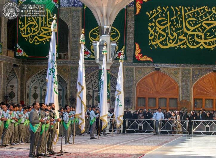 تصاویری بینظیر از مراسم تعویض پرچم ایوان طلای حرم امام علی(ع)
