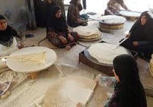 پخت بیش از یک تن نان محلی برای سوگواران لاسجردی