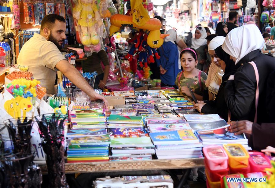 تصاویر روز: از آغاز فصل مدارس در دمشق تا آمادگی نیرو&zwnj;های کُرد برای مقابله با حمله ترکیه