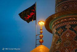 تعویض پرچم حرم مطهر حضرت شاهچراغ(ع)