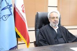 اصلاح تابلوی بدون عنوان شهید در یکی از کوچه های زنجان