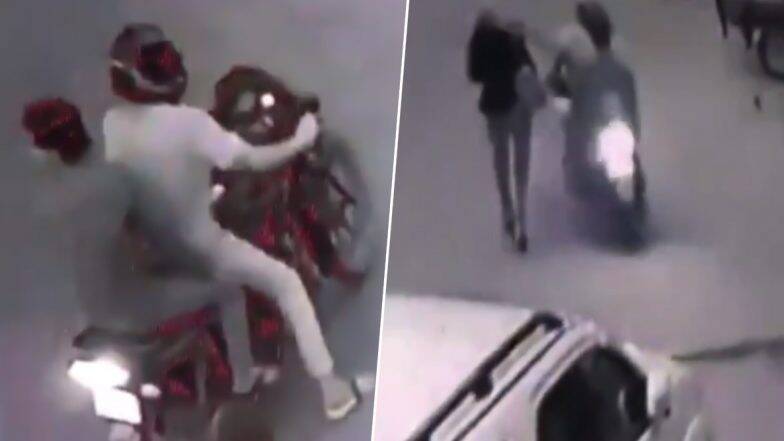 لحظه سرقت تلفن همراه خبرنگار زن در خیابان + فیلم///