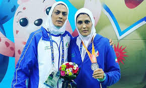 خواهران منصوریان در لیگ ووشو چین مبارزه می‌کنند