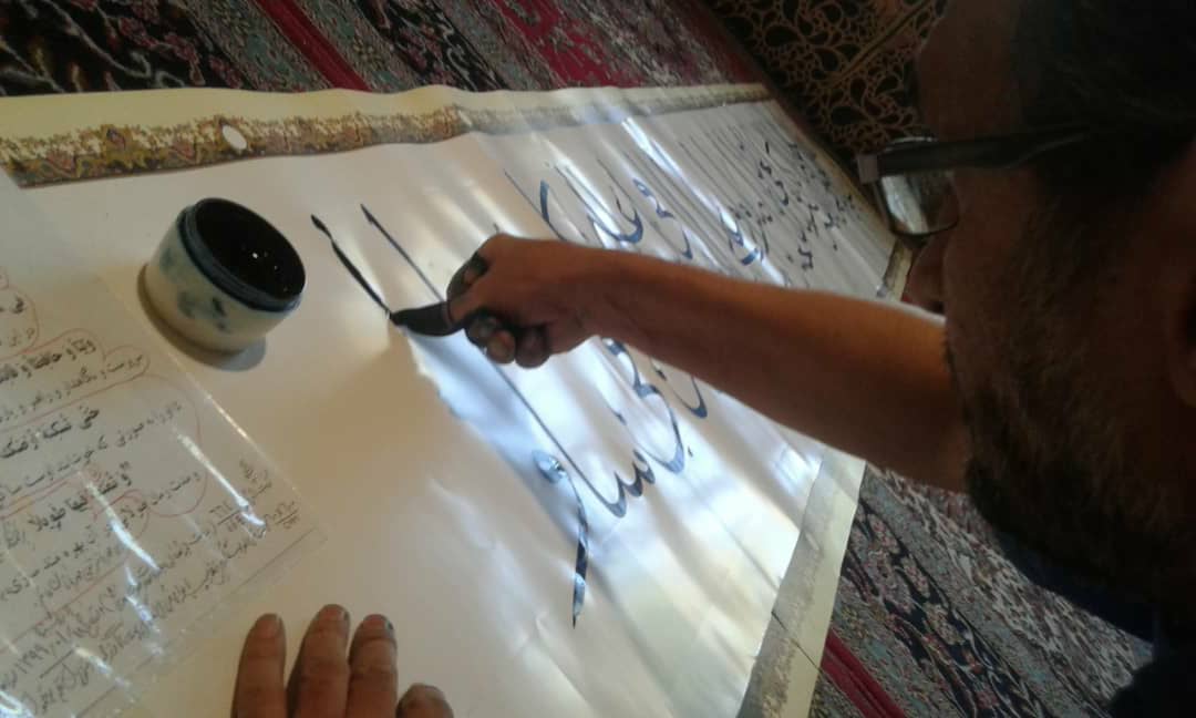 کتابت دعای فرج با ناخن انگشت شست برای نخستین بار در جهان + تصاویر