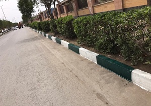 تداوم کار رنگ آمیزی جداول در برخی خیابان های اهواز