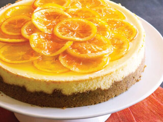 ۲ طرز تهیه چیز کیک پرتقال یخچالی با پایه بیسکویت و کیک اسفنجی