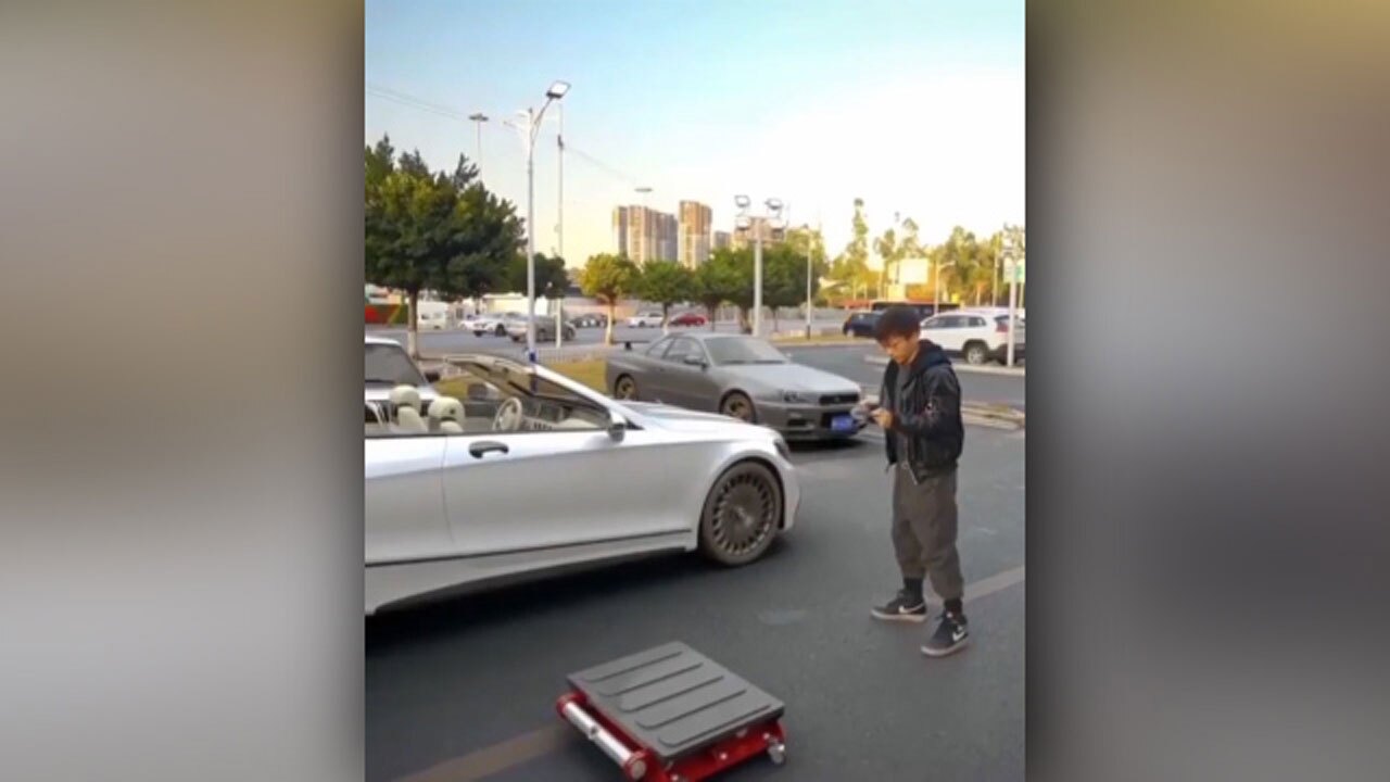 پارک کردن خودرو با استفاده از ربات + فیلم