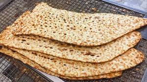 سنگک داغ، کمک مومنانه نانوای اراکی