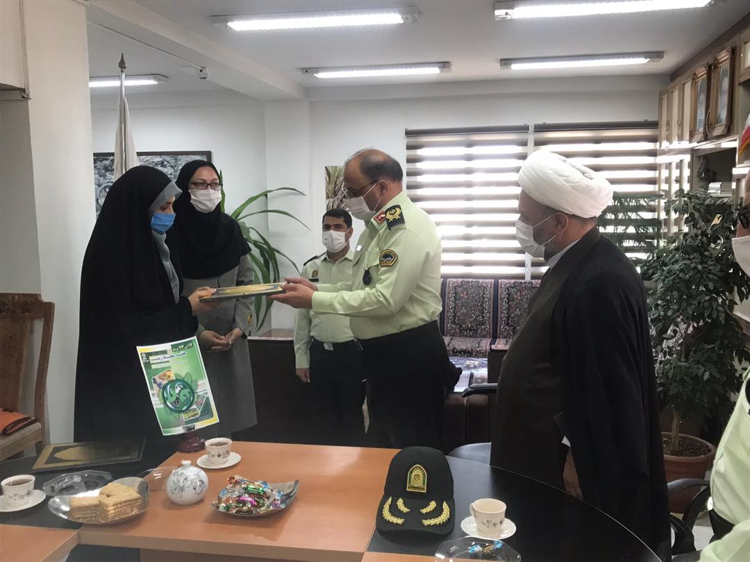 تجلیل از خانواده شهید محیط بان