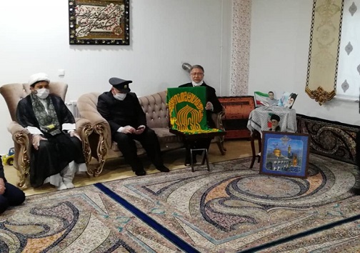 بیرق حرم رضوی درمنزل شهید شکری