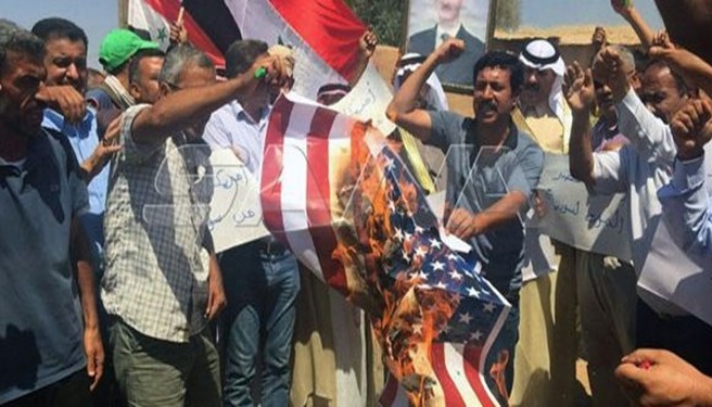 به آتش کشیدن پرچم آمریکا در تظاهرات مردم سوریه