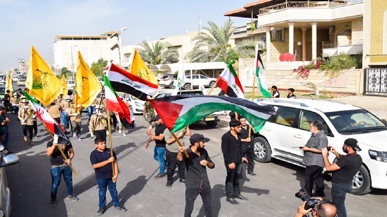 جنبش نجَباء در سراسر عراق پرچم حمایت از فلسطین را بالا برد + تصاویر