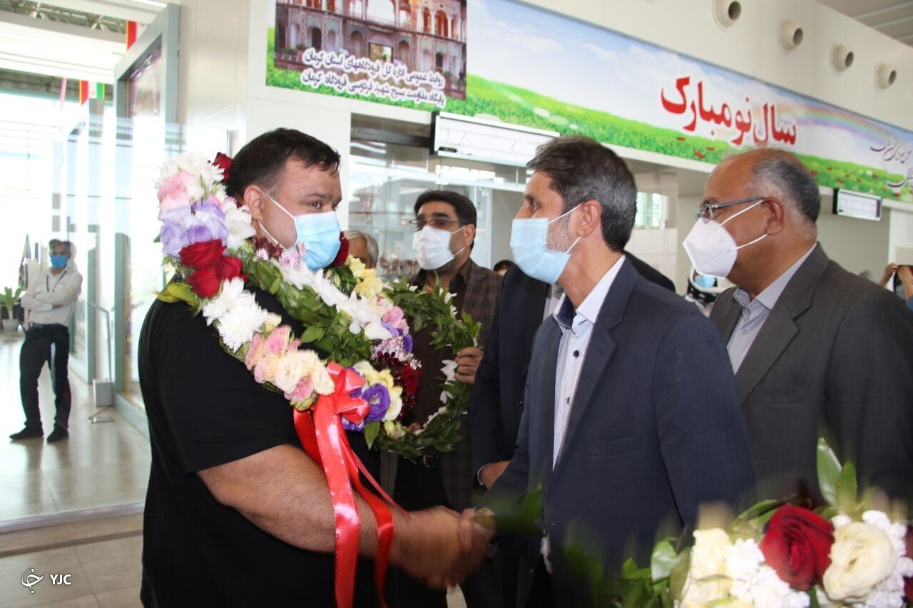 آیین استقبال از قهرمان سنگین وزن پاراوزنه&zwnj;بردای جهان در کرمان + تصاویر