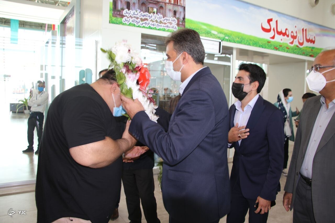 آیین استقبال از قهرمان سنگین وزن پاراوزنه&zwnj;بردای جهان در کرمان + تصاویر