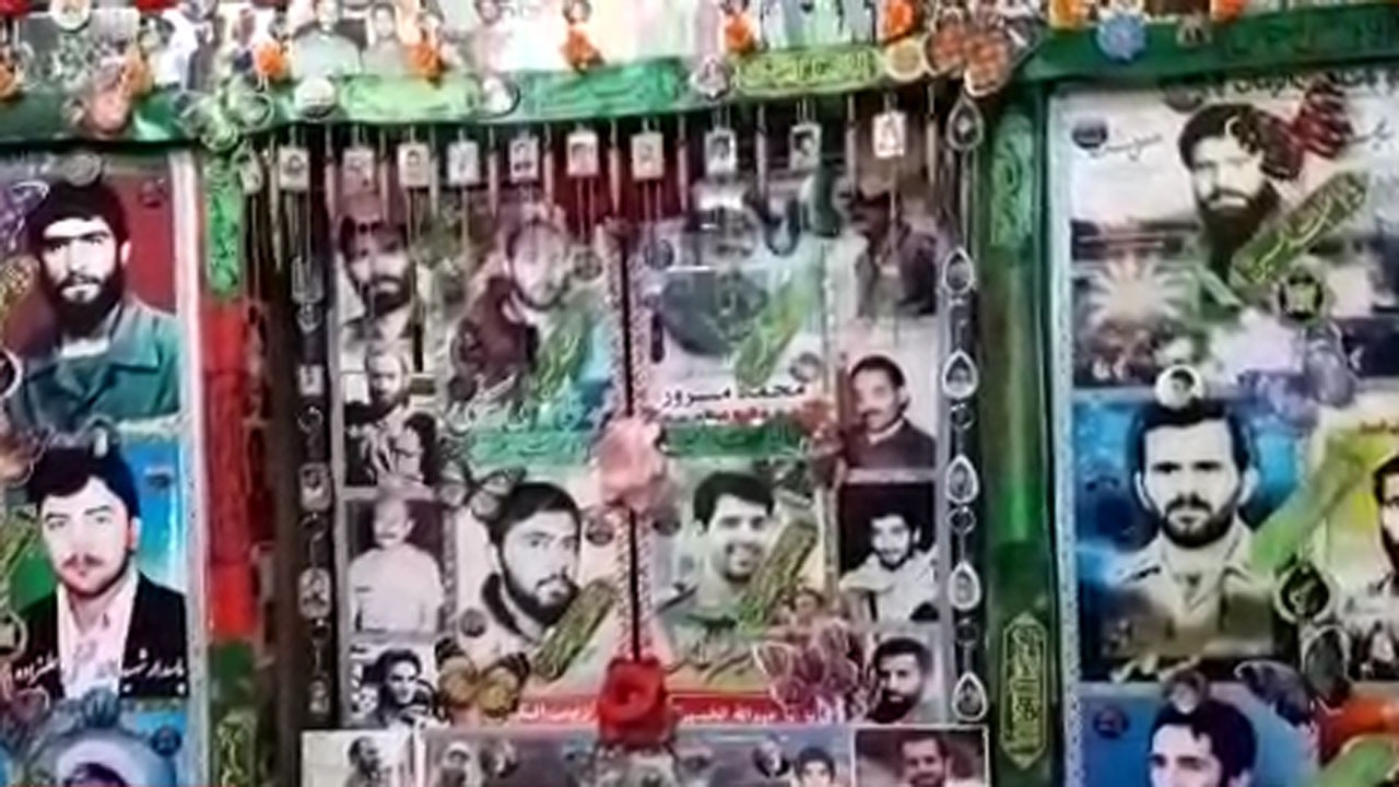مزین کردن یک مغازه با تصاویر شهدا در ملایر + فیلم