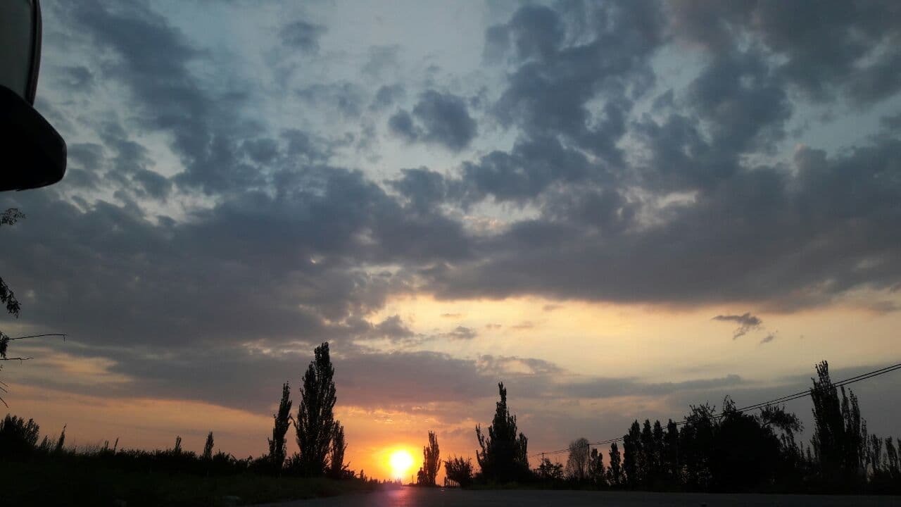 چشم اندازی از غروب خورشید در روستای ابراهیم حصاری + تصاویر