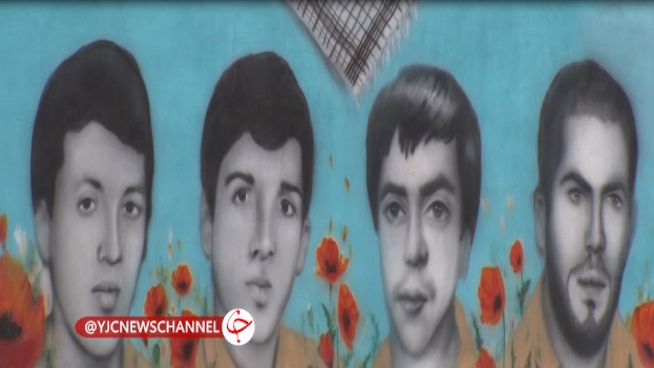 نقاش بنابی چهره شهیدان را بر کوی و برزن به تصویر کشید