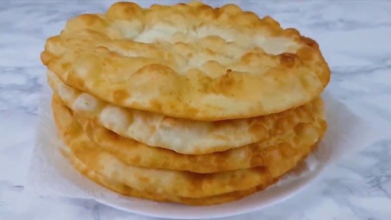 با چلپک نان روغنی محبوب در افغانستان بیشتر آشنا شویم +فیلم و تصاویر