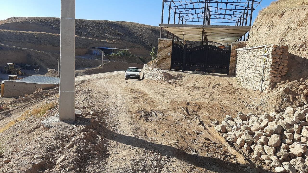 ساخت دیواری در حاشیه مسیری خطرناک، به همت مردم روستای &laquo;توآباد&raquo; + تصاویر