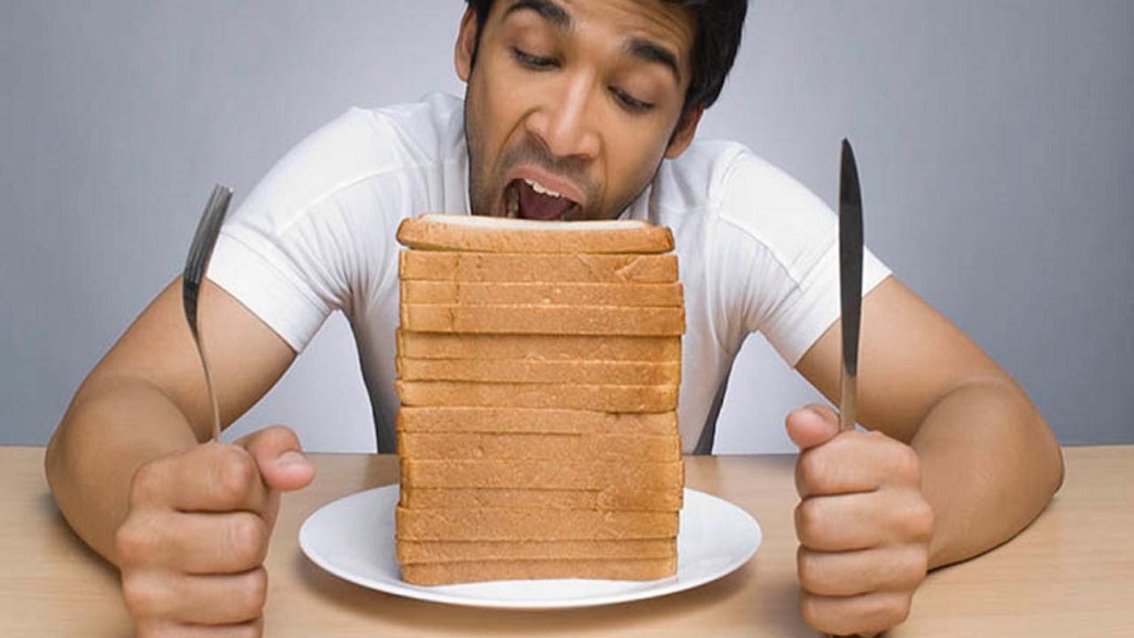 نشانه‌هایی که می‌گوید در خوردن نان زیاده‌روی می‌کنید!