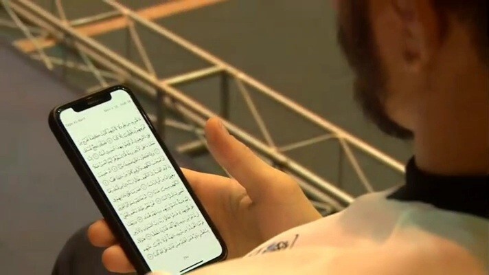 قرآن خواندن کشتی گیر روس در مسابقات لیگ برتر
