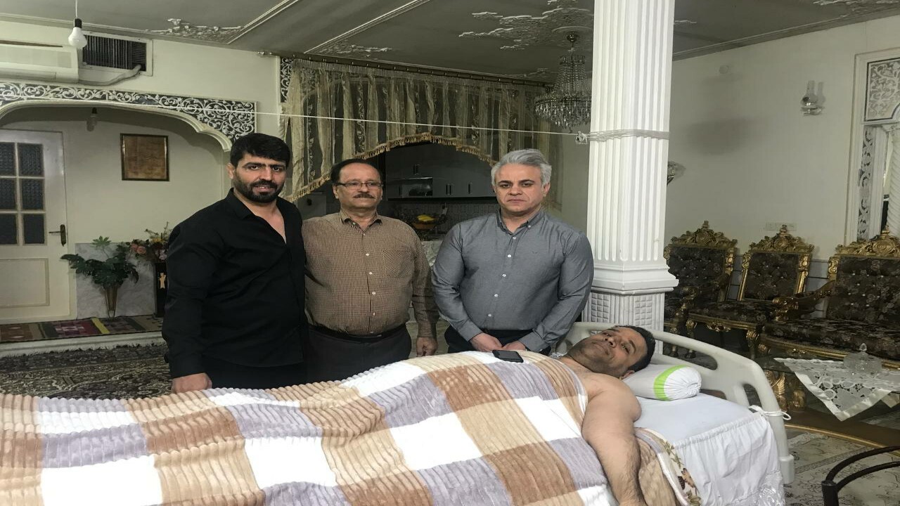 عیادت از ورزشکار قطع نخاع قم