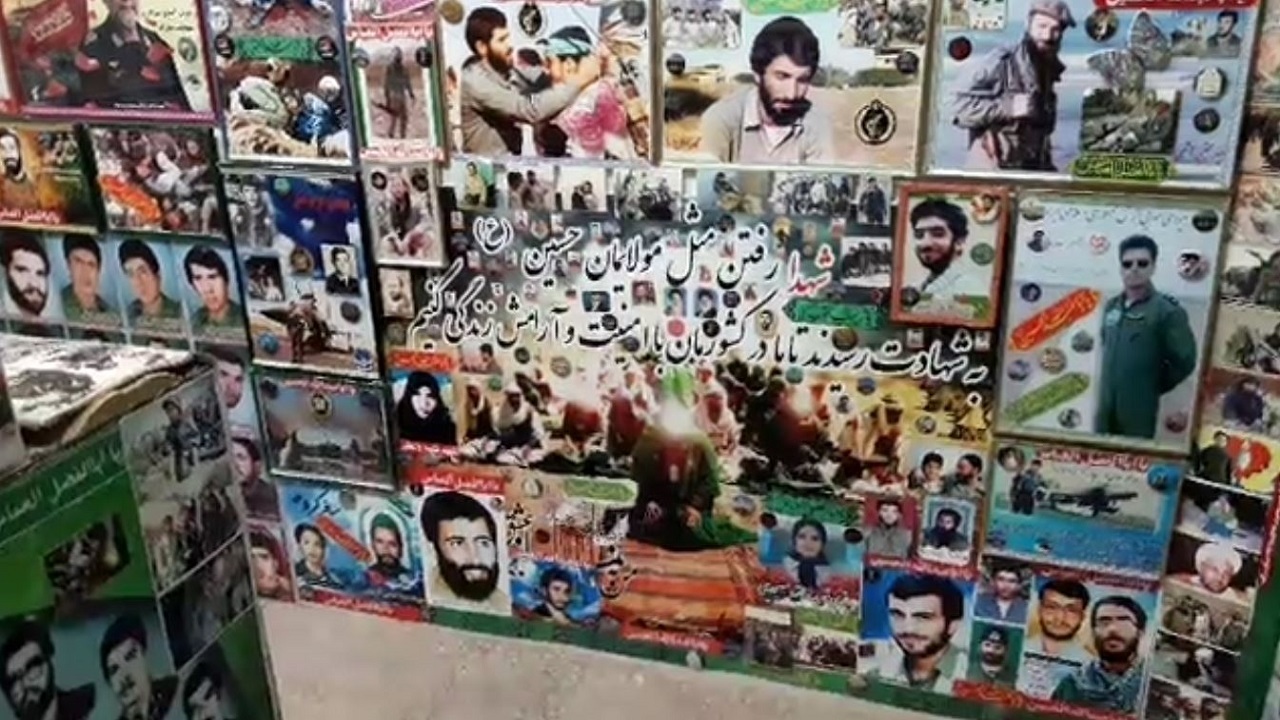 مغازه ای که مزین به تصاویر تمام شهدای کشور است