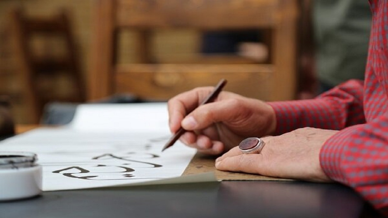 کتابت قرآن کریم به قلم خوشنویس سامانی