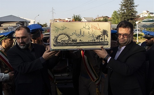 خاکسپاری پیکر یک شهید گمنام در دادگستری گیلان