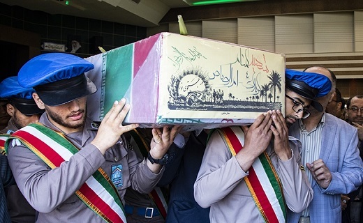 خاکسپاری پیکر یک شهید گمنام در دادگستری گیلان