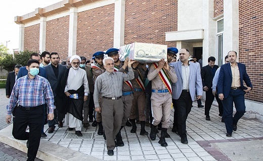 خاکسپاری پیکر یک شهید گمنام در دادگستری گیلان
