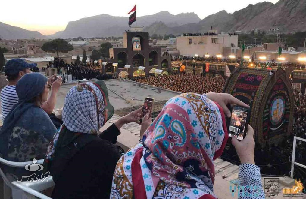 واکنش عکاس انگلیسی به بارش باران در روز عاشورا