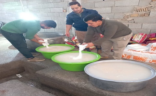 پخت و توزیع غذای نذری بین نیازمندان در ماهدشت