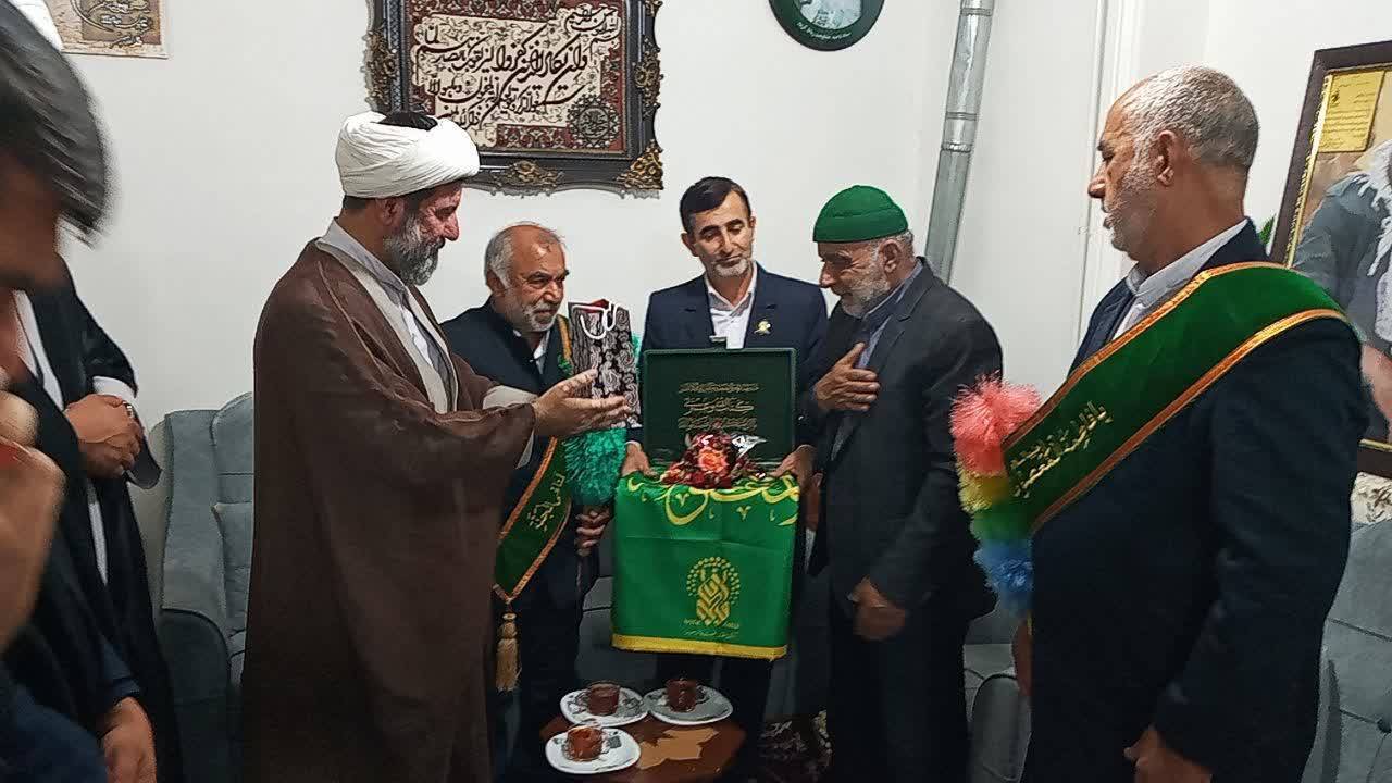 دیدار خادمین حرم حضرت معصومه (س) با خانواده شهید شنایی + تصاویر