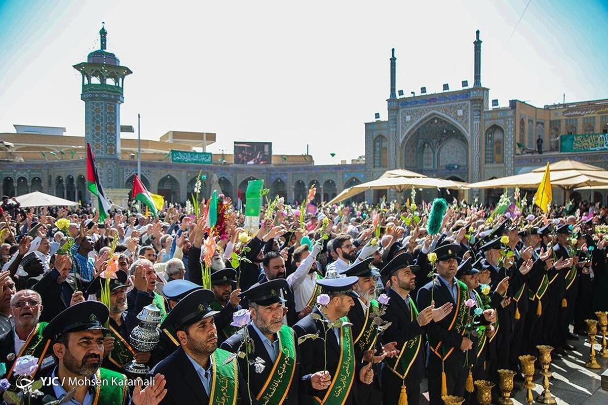آئین تعویض پرچم گنبد حرم حضرت معصومه (س)