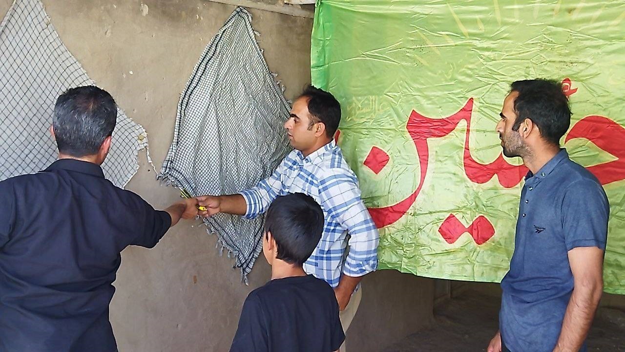 معابر روستای ده محمد با نصب پرچم سیاه محرمی شد