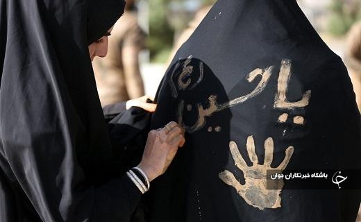 آیین گل مالی لرستانی&zwnj;های قم در روز عاشورا برگزار شد