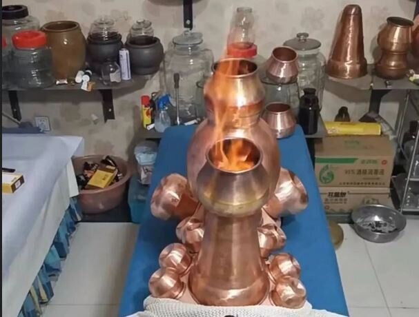 بادکش با ظروف مسی برافروخته