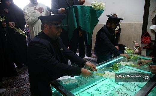 غبارروبی مقبره شیخ فضل الله نوری در قم