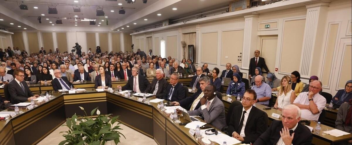 جاوید رحمان در نشست منافقین جاوید رحمان در نشست منافقین